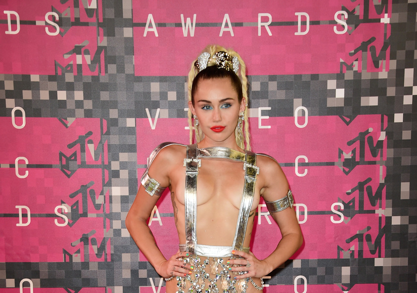 Miley Cyrus Goes Topless... Again!