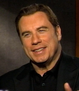 Extra John Travolta says he doesn't have time for space.
