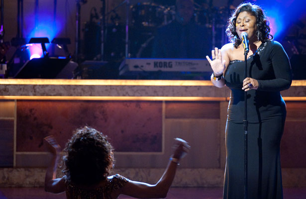 Kim sings for Whitney/Getty Images burrell-whitney.jpg