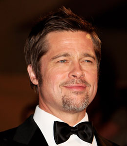 Getty Images Brad Pitt answers your questions with the 'Extra' fancam!