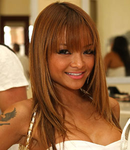 Getty Images Reality TV star Tila Tequila believes 'justice has not been served' after the San Diego District Attorney's office dropped the charges against her ex-boyfriend Shawne Merriman.
