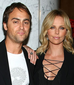 Getty Images When will Charlize Theron and boyfriend Stuart Townsend walk down the aisle?