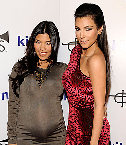 Getty Images Kim Kardashian Kourtney Kardashian pregnant
