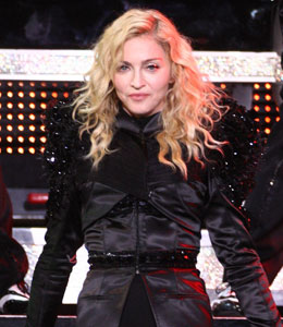Getty Images Madonna paid tribute on Thursday night to the two people who lost their lives while constructing her concert stage in France.