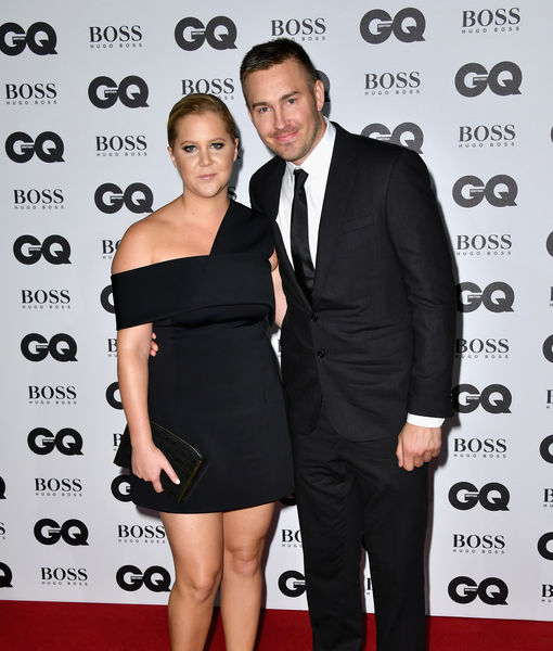Amy Schumer and Ben Hanisch Split