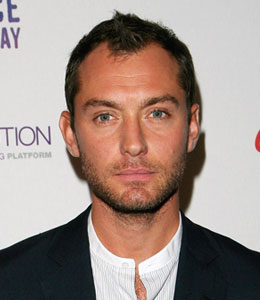 Getty Images Jude Law whacked a female photographer on the noggin in London on Wednesday night.